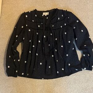 Elegant Black Blouse with White Floral Patterns